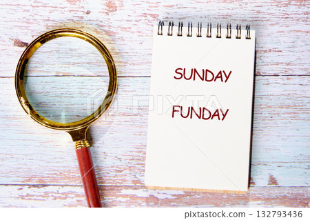 A cozy Sunday Funday scene features a notebook with emphasis on fun, surrounded by a magnifying glass, inviting creativity and exploration with friends and family A cozy Sunday Funday scene features a notebook with emphasis on fun, surrounded by a magnifying glass, inviting creativity and exploration with friends and family 132793436