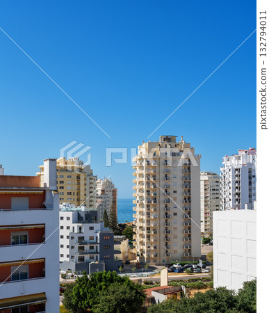 Armacao de Pera, Portugal, Contemporary home near calm shoreline, Sunlit apartment situated in peaceful seaside neighborhood, Radiant residence with modern design Armacao de Pera, Portugal, Contemporary home near calm shoreline, Sunlit apartment situated in peaceful seaside neighborhood, Radiant residence with modern design 132794011
