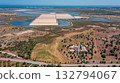 salt lakes, industry, Castro Marim, Portugal, aerial, Saline industrial landscape, Natural wetlands adjacent to salt production sites, Contrast between wild wetlands 132794067
