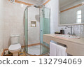 Guestready bathroom with elegant decor, Bright bathroom featuring modern fixtures and tidy presentation, Wellorganized restroom with glass enclosure and welcoming 132794069