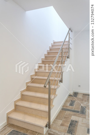 Bright staircase design, Contemporary stairwell with natural lighting and sleek details, Stylish sunlit staircase showcasing minimalist architecture and technical finesse 132794074