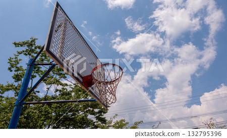 A basketball goal that shines in the blue sky A basketball goal that shines in the blue sky 132795396