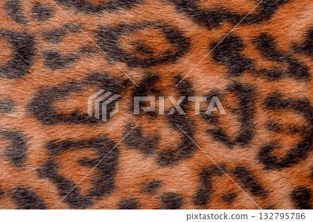 Dark leopard faux fur macro photo as a background. 132795786