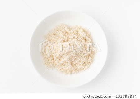 Moshio seaweed salt in a plate on a white background Moshio seaweed salt in a plate on a white background 132795884