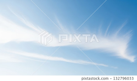 A midday blue sky and gently flowing clouds A midday blue sky and gently flowing clouds 132796033