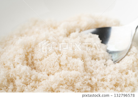 Close-up of seaweed salt being scooped up with a spoon Close-up of seaweed salt being scooped up with a spoon 132796578