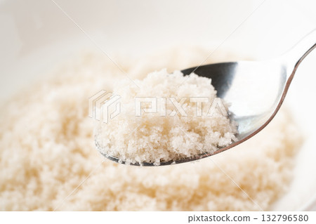 Close-up of seaweed salt scooped up with a spoon Close-up of seaweed salt scooped up with a spoon 132796580