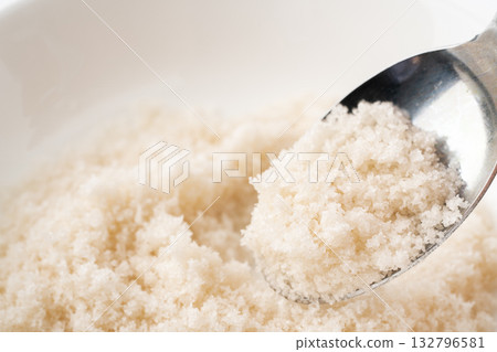Close-up of seaweed salt scooped up with a spoon 132796581