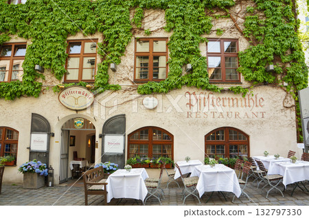 The exterior of a stylish restaurant in downtown Munich, Germany The exterior of a stylish restaurant in downtown Munich, Germany 132797330
