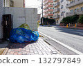 Household waste placed at the entrance of an apartment building Household waste placed at the entrance of an apartment building 132797849