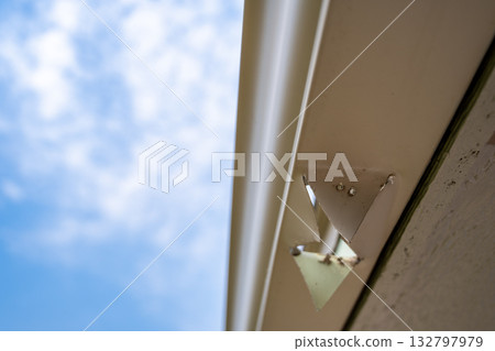 Cut edges in a gutter system for connecting a down spout drain. 132797979