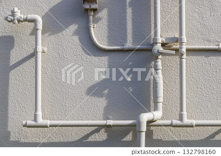 A shape created by gas pipes installed on the wall A shape created by gas pipes installed on the wall 132798160