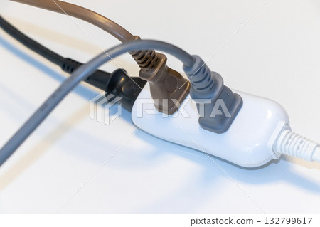 Plug inserted into a power strip 132799617