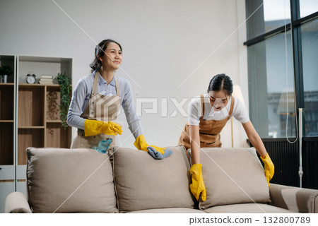 Efficient and professional housekeeping with our dynamic cleaning duo. Perfect teamwork ensures spotless cleanliness Efficient and professional housekeeping with our dynamic cleaning duo. Perfect teamwork ensures spotless cleanliness 132800789