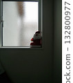 Red Christmas boots and Santa Claus on a windowsill 132800977