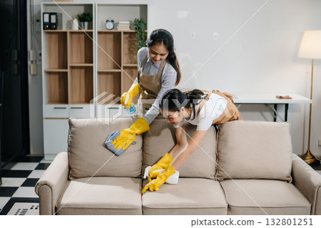 Efficient and professional housekeeping with our dynamic cleaning duo. Perfect teamwork ensures spotless cleanliness Efficient and professional housekeeping with our dynamic cleaning duo. Perfect teamwork ensures spotless cleanliness 132801251