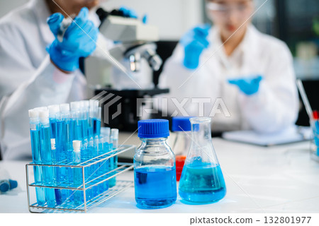 Female Scientists Conducting Chemistry Research in Modern Laboratory Female Scientists Conducting Chemistry Research in Modern Laboratory 132801977