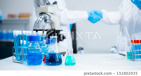 Female Scientists Conducting Chemistry Research in Modern Laboratory 132802035