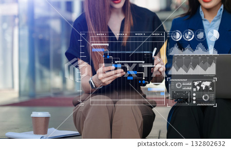 Investor analyzing stock market report and financial dashboard with business intelligence , with key performance indicatorsBusiness team meeting. Investor analyzing stock market report and financial dashboard with business intelligence , with key performance indicatorsBusiness team meeting. 132802632