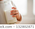 clean child holding milk bottle 132802871