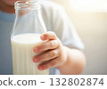 Child holding milk bottle background 132802874