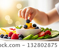 Child hand reaching  fruits background design 132802875