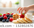 Child hand reaching food background 132802876