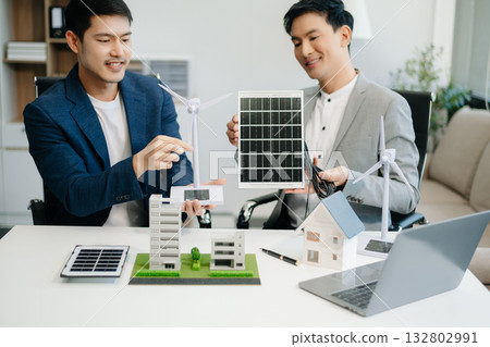 ESG concept of environmental, Green ethical business preserving resources, reducing CO2, Business person team working on laptop virtual smartphone 132802991