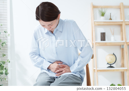 Middle-aged woman with stomachache 132804055