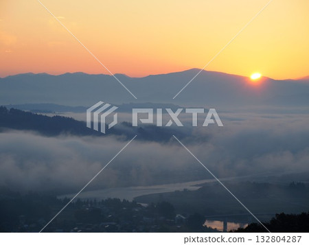 Sea of clouds sunrise over the Echigo Sanzan mountains from the Ojiyayama Honyama Plateau in Ojiya City, Niigata Prefecture Sea of clouds sunrise over the Echigo Sanzan mountains from the Ojiyayama Honyama Plateau in Ojiya City, Niigata Prefecture 132804287