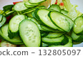 Fresh cucumber slices in a salad bowl, close up of fresh cucumber slices 132805097