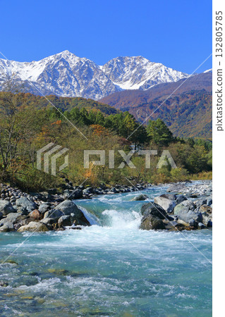 Hakuba mountain range and three-tiered autumn leaves 132805785
