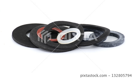 Collection of various rubber gaskets arranged and isolated on a plain white background. 132805794