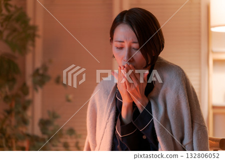 Unwell woman in pajamas Unwell woman in pajamas 132806052