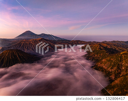 Aerial view Mountains at Bromo volcano during sunrise sky,Beautiful Mountains Penanjakan in Bromo Tengger Semeru National Park,East Java,Indonesia.Nature landscape background 132806417