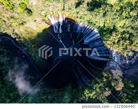 Aerial view of the Tumpak Sewu Waterfalls also known as Coban Sewu.Beautiful Tumpak Sewu Waterfalls are a tourist attraction in East Java, Indonesia.Amazing travel destination in asia 132806440