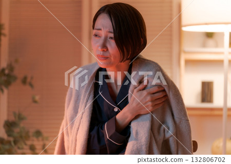 Unwell woman in pajamas Unwell woman in pajamas 132806702