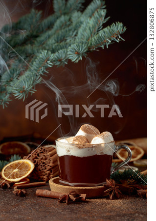 Hot chocolate with marshmallows sprinkled with cocoa powder. Hot chocolate with marshmallows sprinkled with cocoa powder. 132806875