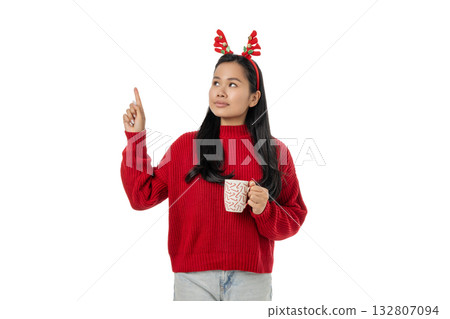 Woman in festive attire sips a hot drink, isolated, PNG 132807094