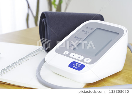 Image of managing health with a blood pressure monitor 132808620