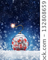 Christmas card with a Christmas ball and a gift inside in the form of a bomb on the snow. Festive banner with hoarfrost on night abstract defocused lights background. 132808659