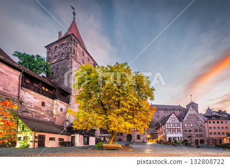Nuremberg, Germany. Tiergartnertor, historical Kaiserburg, morning twilight. 132808722