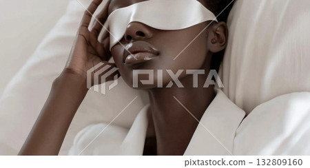 Woman with eye mask in soft light, concept of sleep and health 132809160
