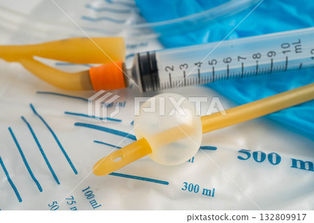 Foley catheter and urine drainage bag collect urine for disability or patient in hospital. Foley catheter and urine drainage bag collect urine for disability or patient in hospital. 132809917
