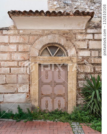 Weathered Ornate Ottoman Doorway with Arched Window, Crescent Moon and Star Symbol, Turkey Weathered Ornate Ottoman Doorway with Arched Window, Crescent Moon and Star Symbol, Turkey 132810108