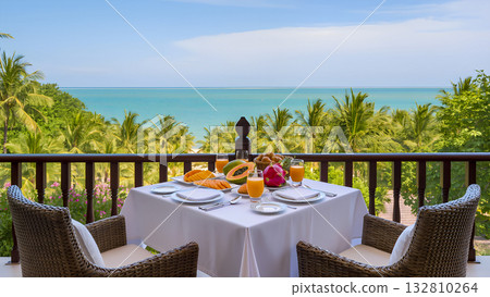 A romantic breakfast on a balcony or terrace with stunning panoramic views A romantic breakfast on a balcony or terrace with stunning panoramic views 132810264