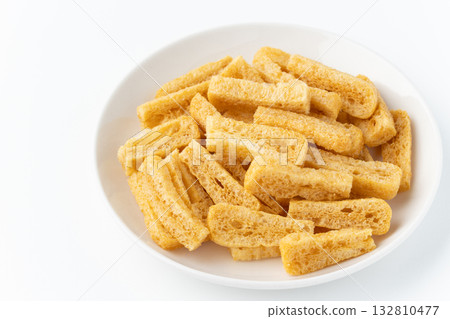 Deep-fried tofu (deep-fried tofu) on a plate on a white background 132810477