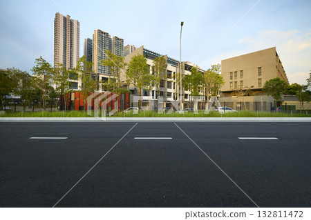 Asphalt road in modern urban residential area Asphalt road in modern urban residential area 132811472