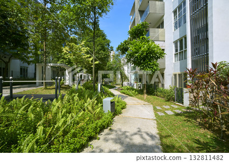 Modern apartment buildings with green park and outdoor exercise area Modern apartment buildings with green park and outdoor exercise area 132811482