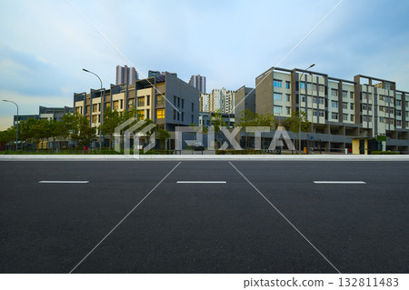 Urban city road with new modern residential buildings Urban city road with new modern residential buildings 132811483